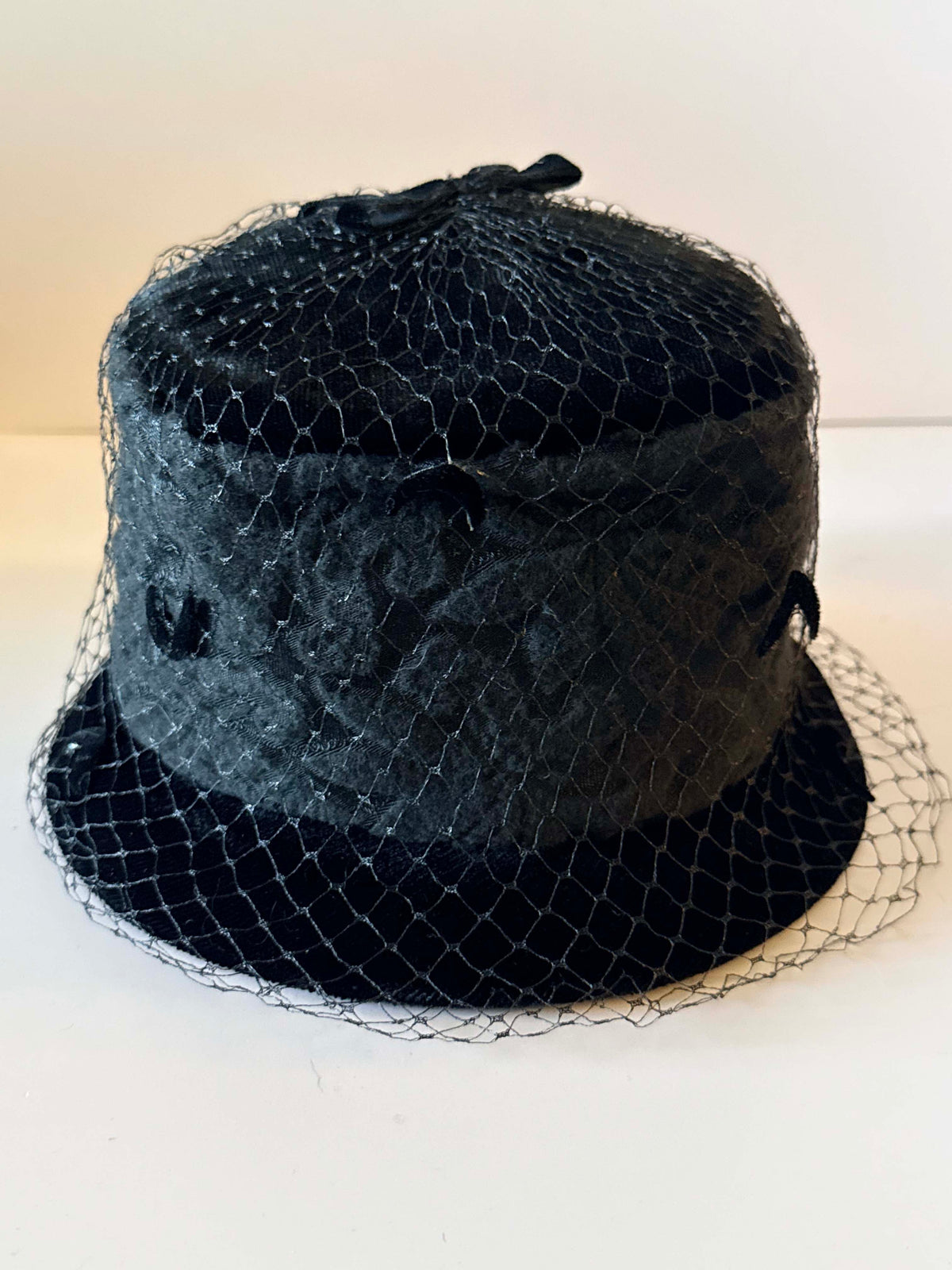 Vintage 1960s Black Velvet Bucket Cloche Hat with Birdcage Veiling and Floral Texture Women's Millinery