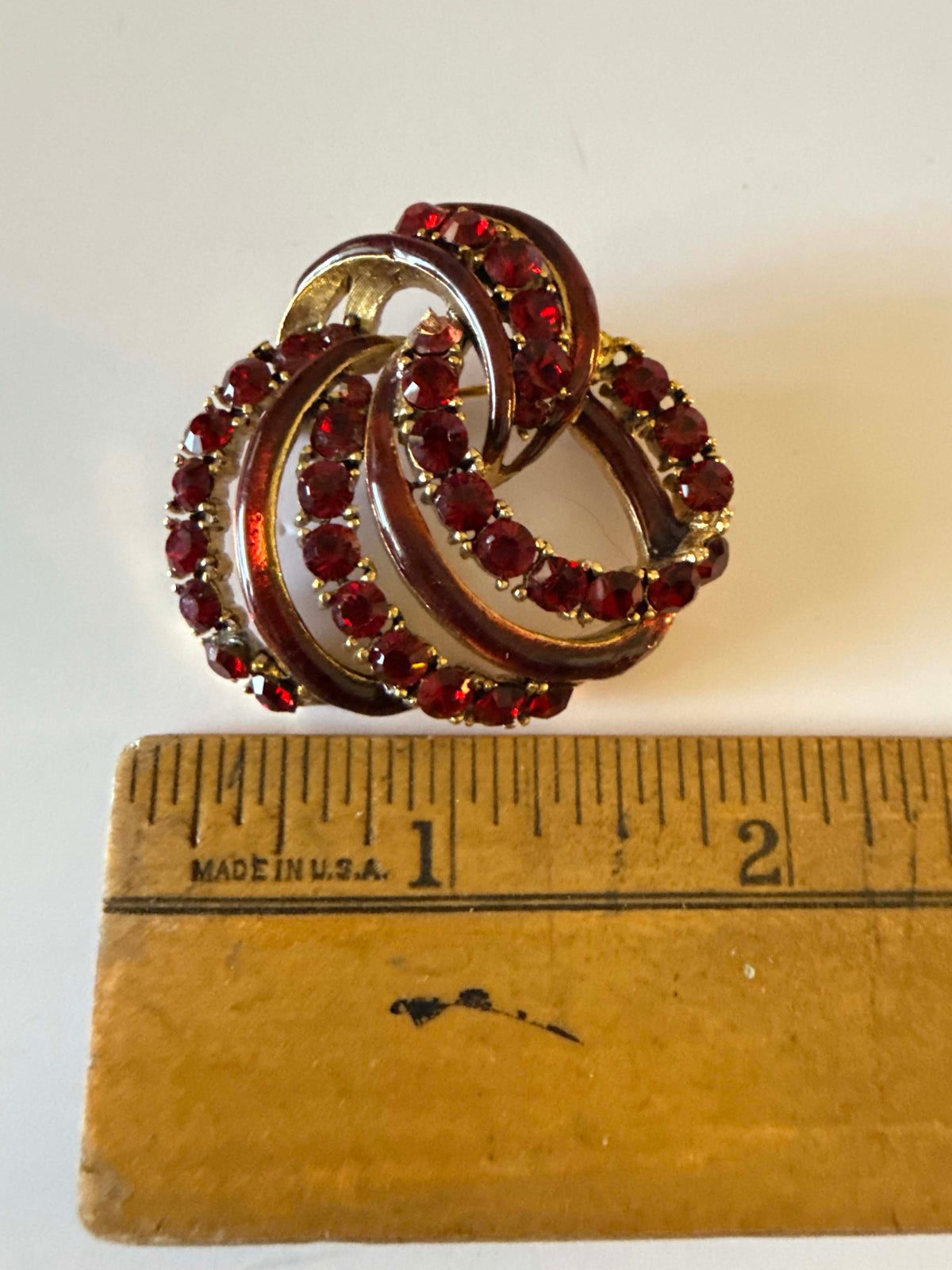 Vintage 1950s Red Rhinestone Brooch Ruby Red Enamel Swirl Ribbon Pin Gold Tone Mid Century Christmas Costume Jewelry