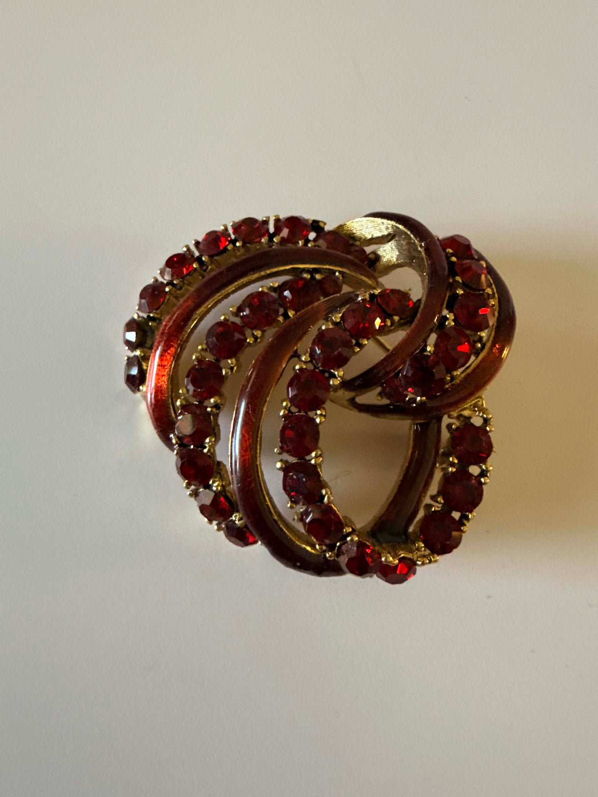 Vintage 1950s Red Rhinestone Brooch Ruby Red Enamel Swirl Ribbon Pin Gold Tone Mid Century Christmas Costume Jewelry