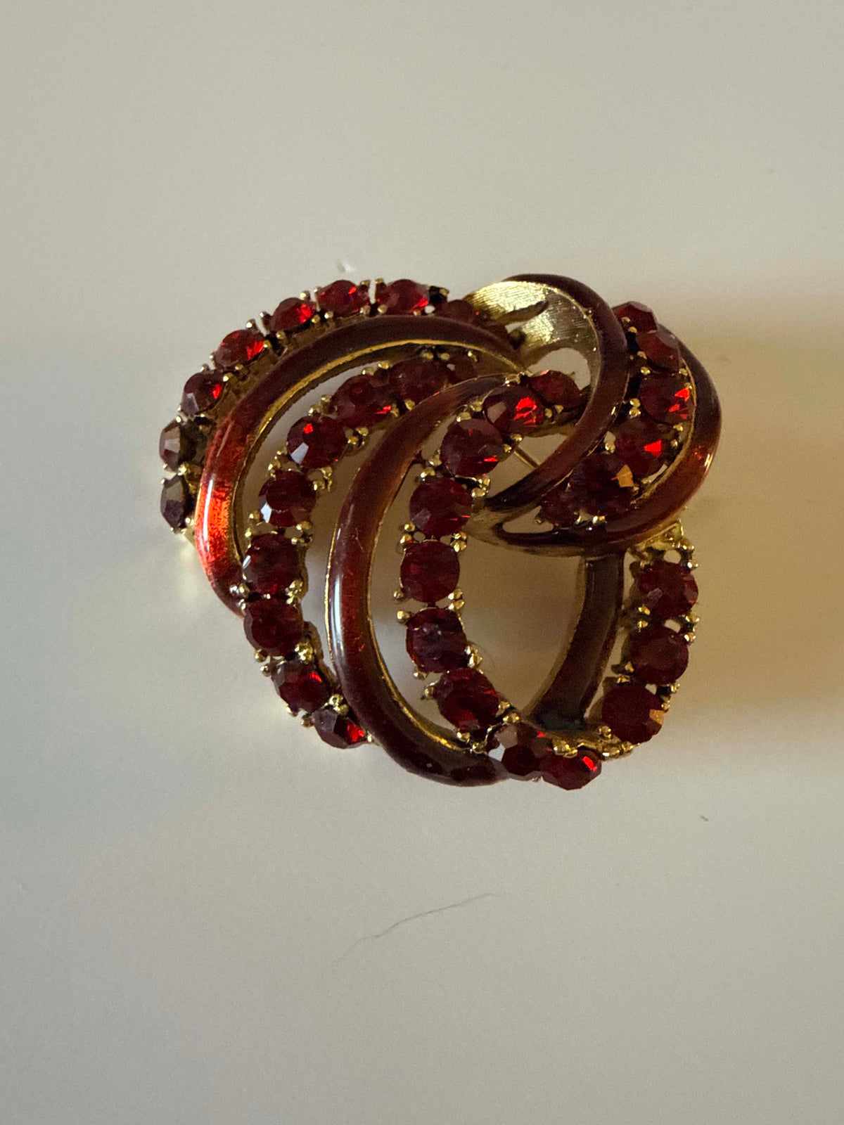 Vintage 1950s Red Rhinestone Brooch Ruby Red Enamel Swirl Ribbon Pin Gold Tone Mid Century Christmas Costume Jewelry