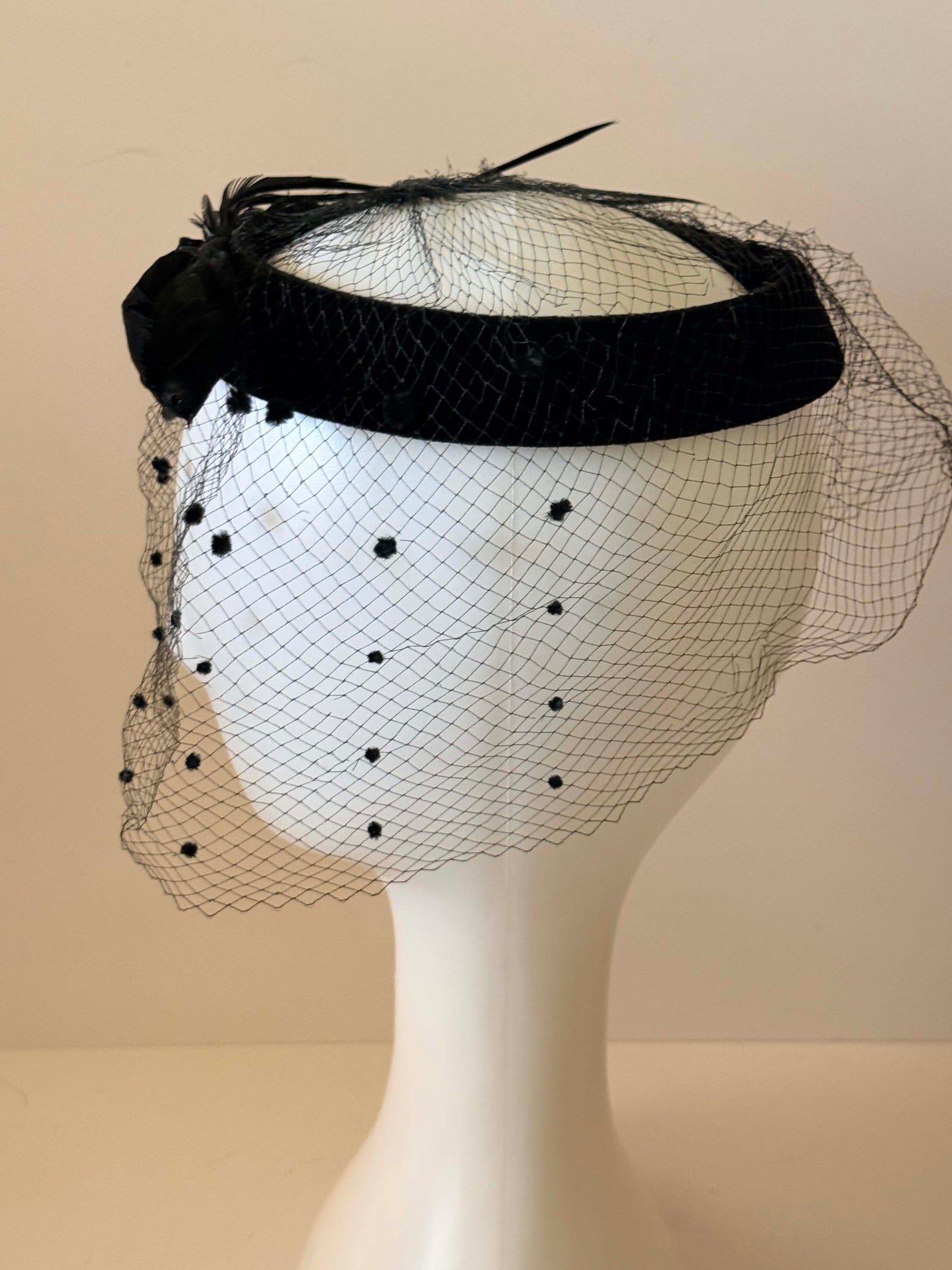 Vintage Black Velvet Halo Hat with Dotted Veil and Feather Trim | 1950s Cocktail Fascinator | Mid Century Tilt Hat | Elegant Mourning Style Millinery